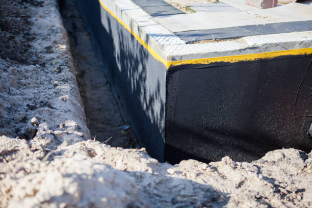 Professional Exterior Waterproofing technician working in Andover, KS
